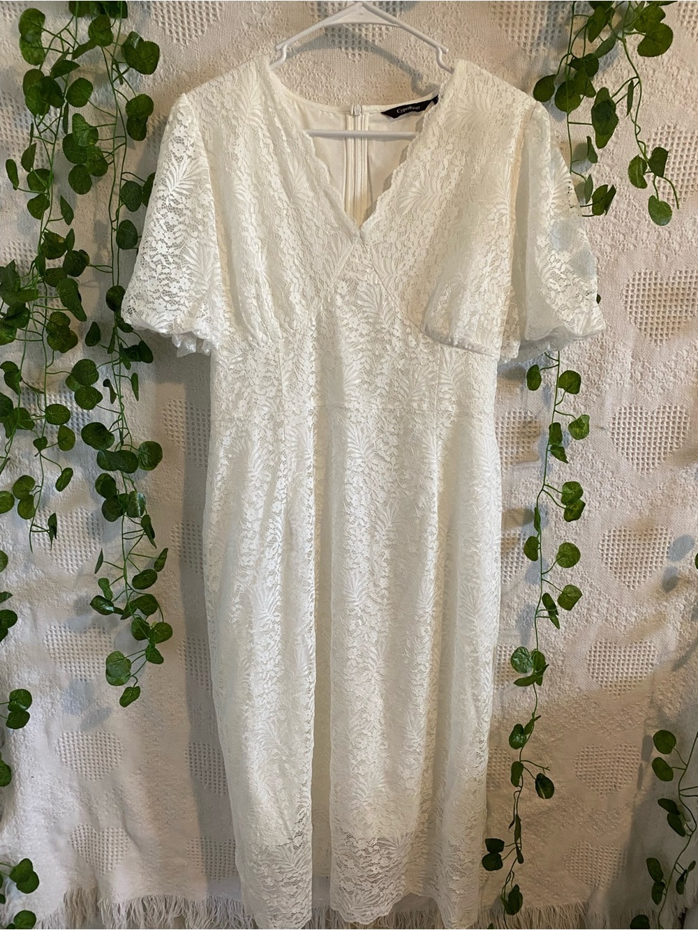 Elegant White Lace Midi Dress with V-Neck and Flutter Sleeves